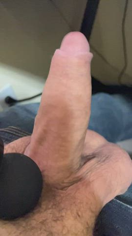 TheraGun on the base of my uncut cock in slowmo