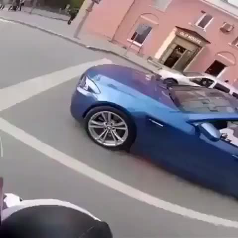 Guy drives off in a flaming car