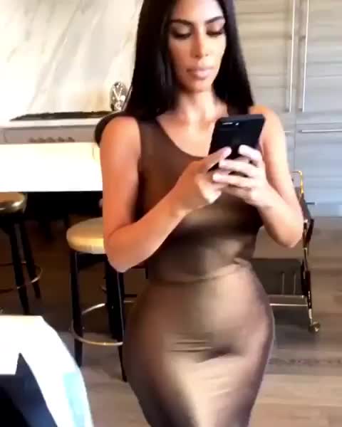 Kim Kardashian showing off her figure