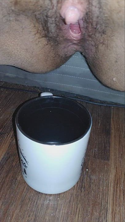 Too lazy to go to the bathroom, so I pissed in a mug instead. I also missed a little.