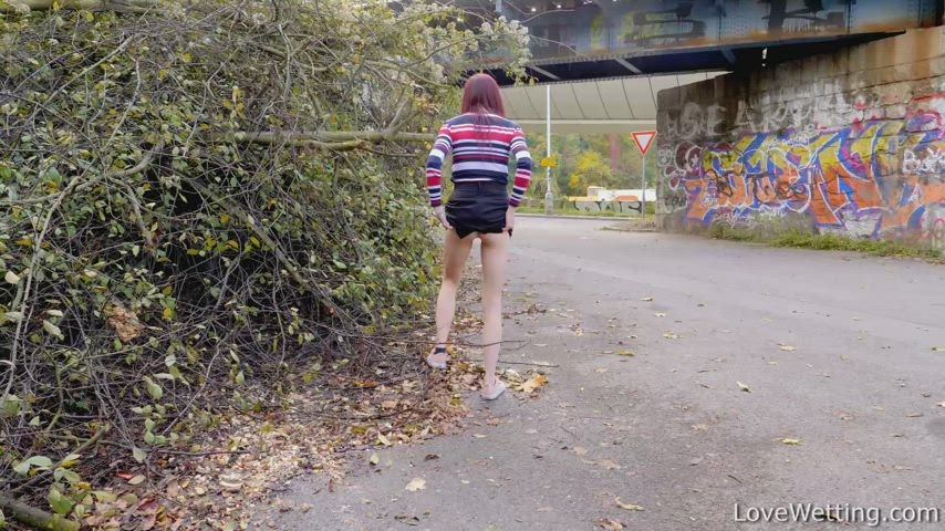Daring girl stands to pee in public