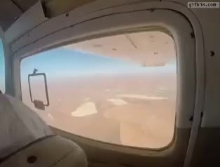 Trying to take a photo in a plane