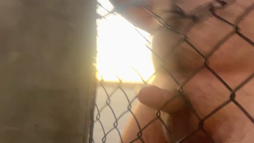 Fucking a chain link fence in public until I cum.