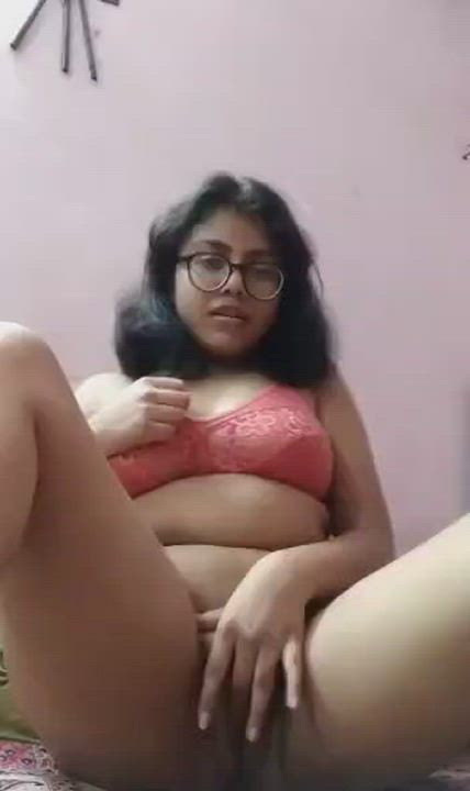 Sexy teen girl with glasses masturbating and fingering herself teasing