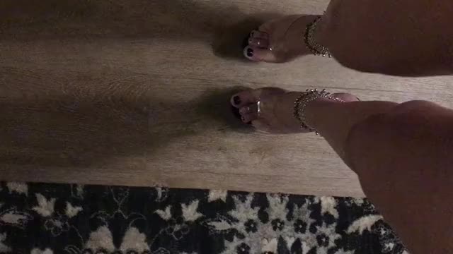 Long legged POV walk in black platform heels and booty shorts