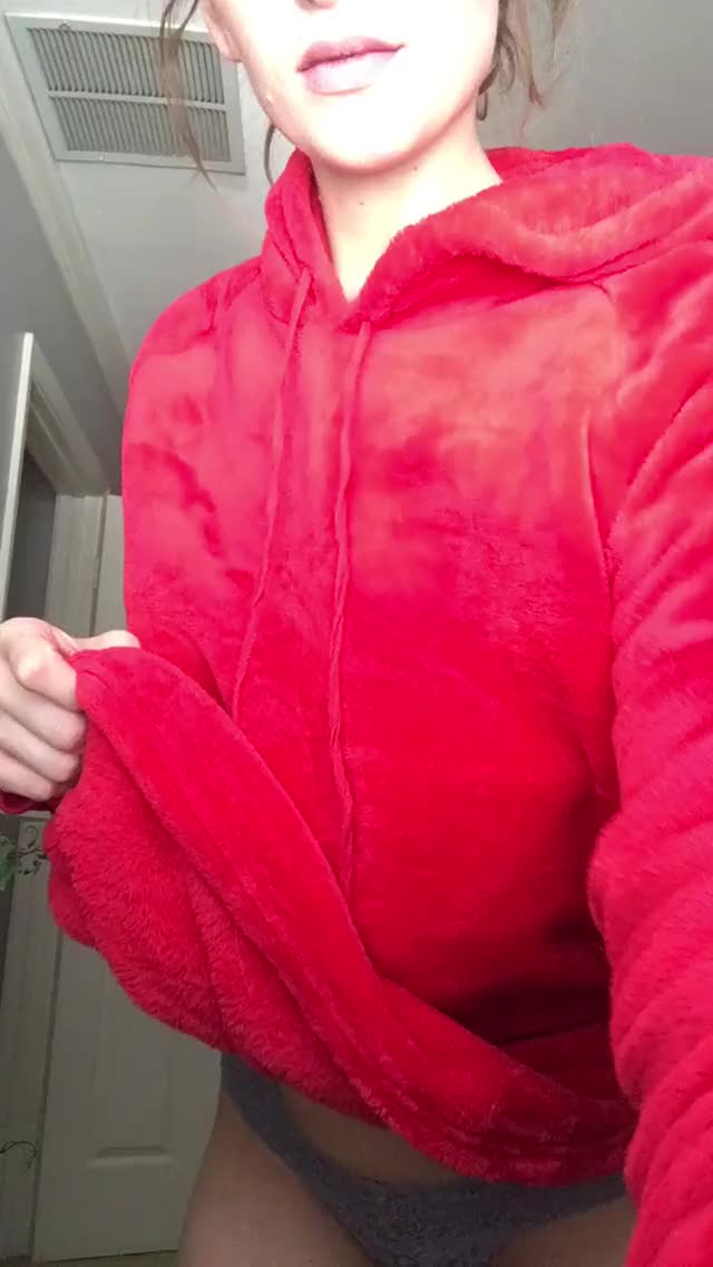 Under the red hoodie