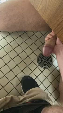 milking his cock under the stall