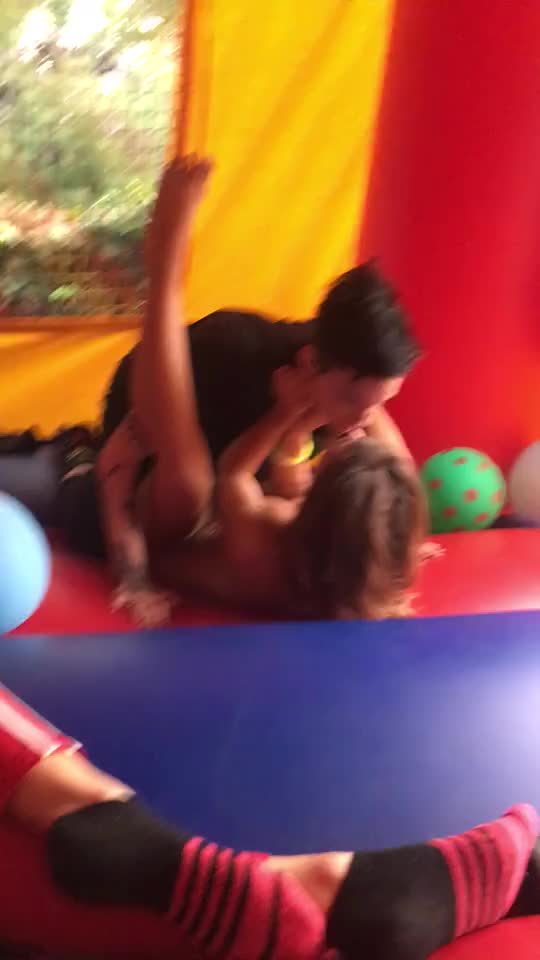 Pornstar Nikki Hearts Making Out and Fingering Girl In Bouncy Castle