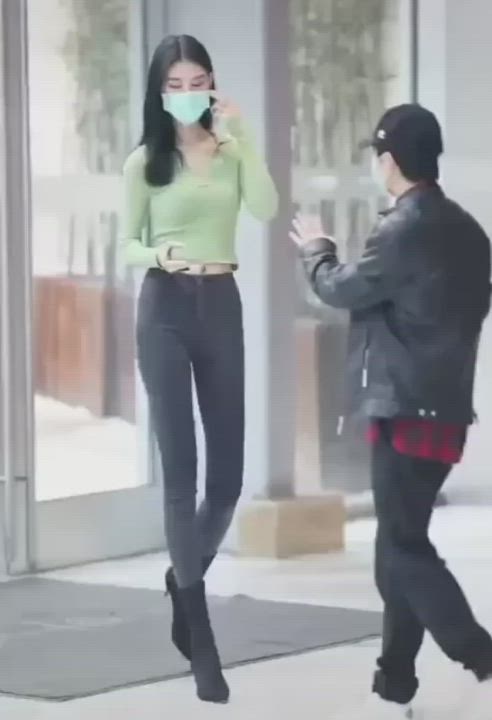 Guy has to go on his tippy toes to take her temperature