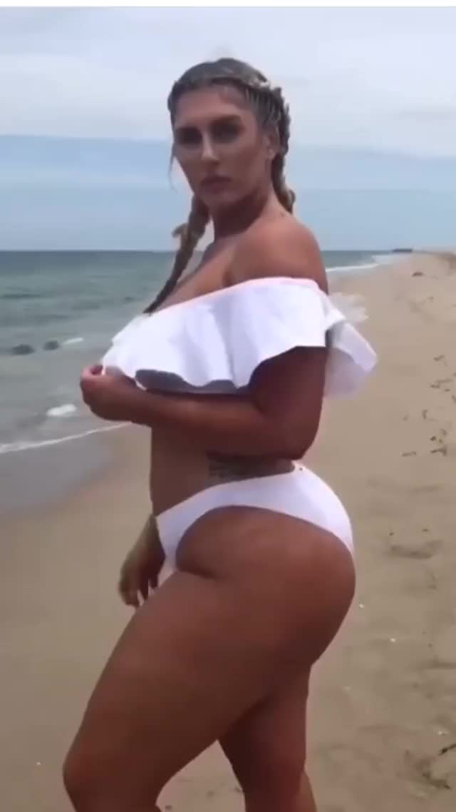 Sexy Sophie Eloise flexing her big booty in white skimpy bikini