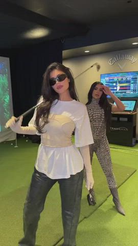 Kim bending over in golf