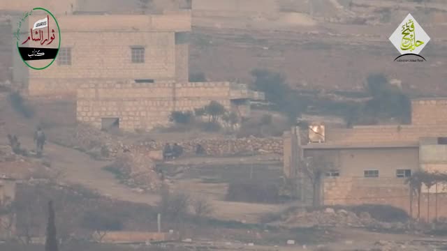 FSA forces engage Syrian militia troopers with an ATGM