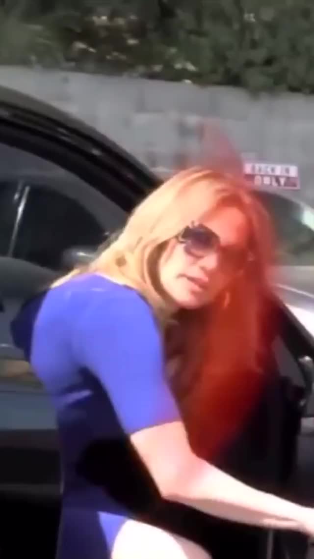 Sexy mother Jennifer Lopez getting her and her fat ass out of the car in tight blue
