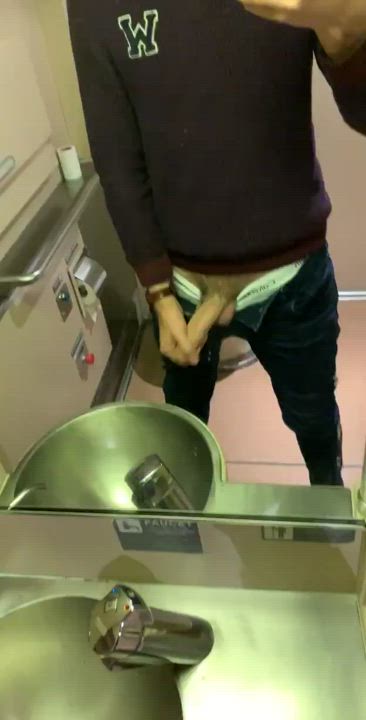 Playing with his cock on the train