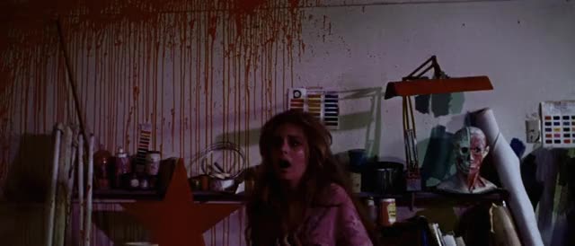 Messiah-of-Evil-1973-GIF-01-15-37-scared-woman-red-splattered-wall