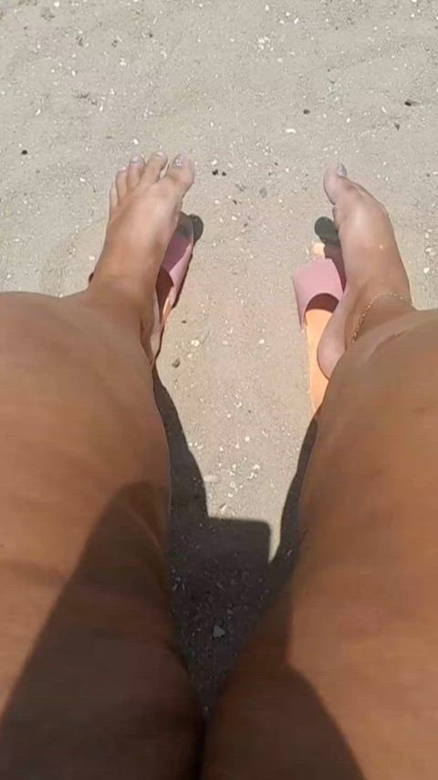 feet in the sun and sea