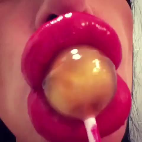 Uber Bimbo Sanja Jojic sucking a lollipop