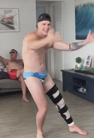 dancing in his underwear with leg in a cast