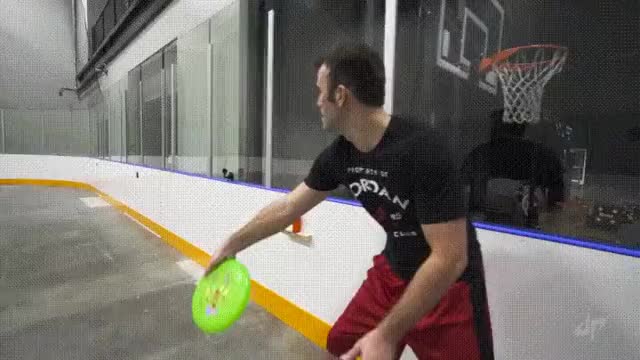 Brody Smith throwing a frisbee to himself