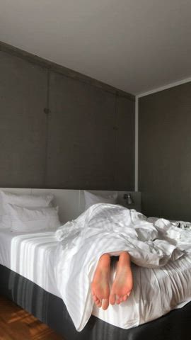 My gfs feet in a hotel bed
