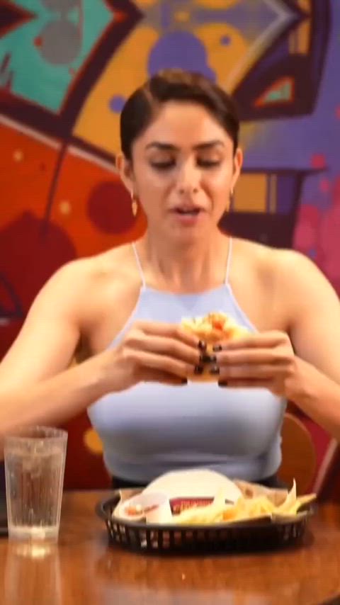 Mrunal Thakur giving us demo of her oral skills while her melons are suffocating