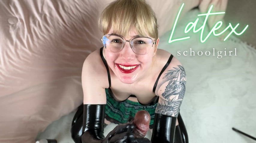 Latex schoolgirl gives handjob