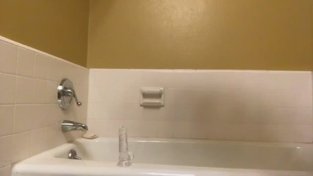 Riding dildo in bathroom