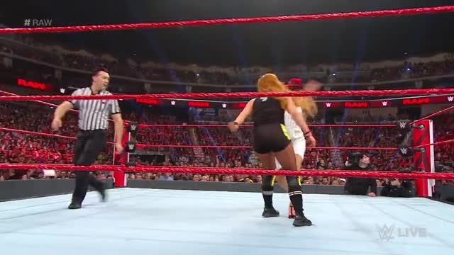 GOOD GOD. Lacey Evans clocks Becky Lynch with two Woman's Rights at the concl...