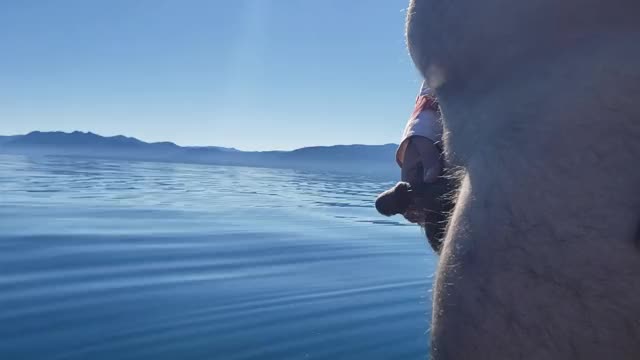 Peeing at the lake, wife films for me