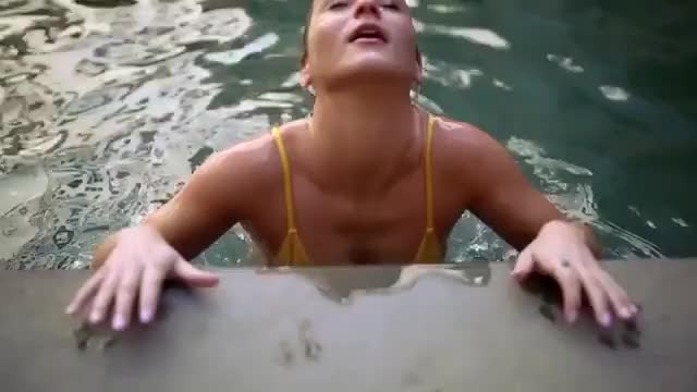 Girl getting out of the pool