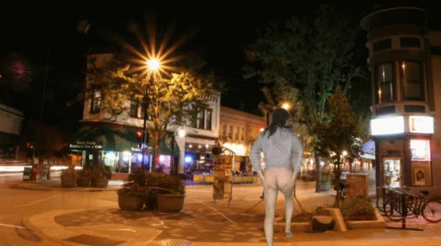 Mark Heffron crosses State Street on a cool autumn night with no pants on