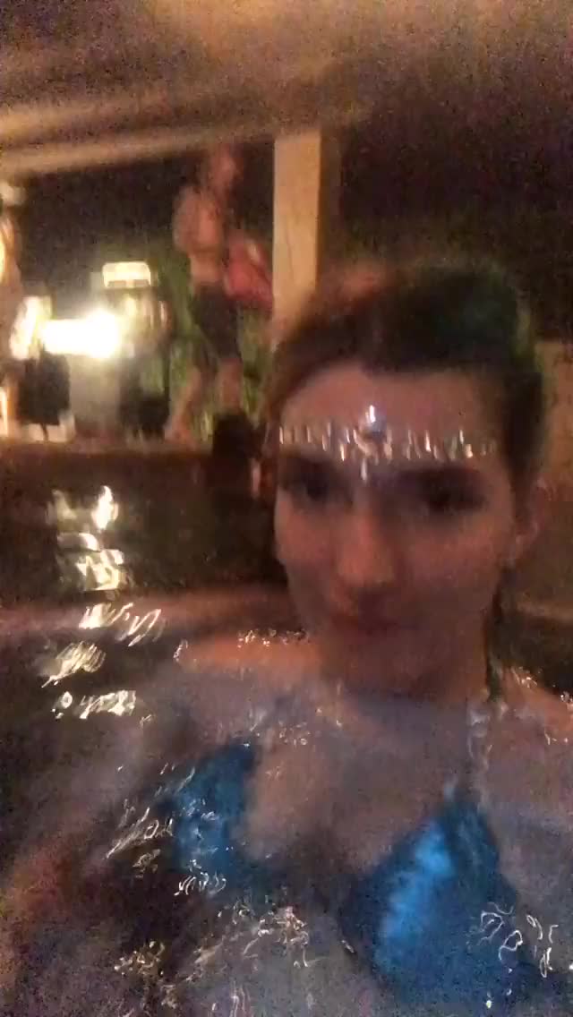 dani thorne and bella Thorne in a pool