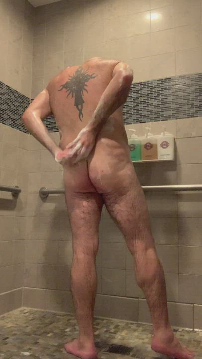 Soaping up in the gym shower [40]