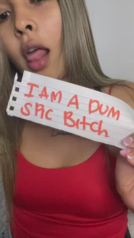 Fan fave sign, made short clip, Im a dumb spi c bitch n what else?