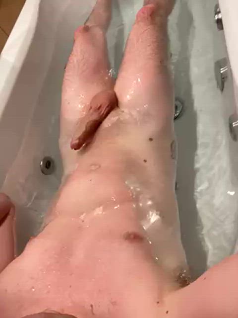 Bath time with a mostly soft cock. Can you make it hard?