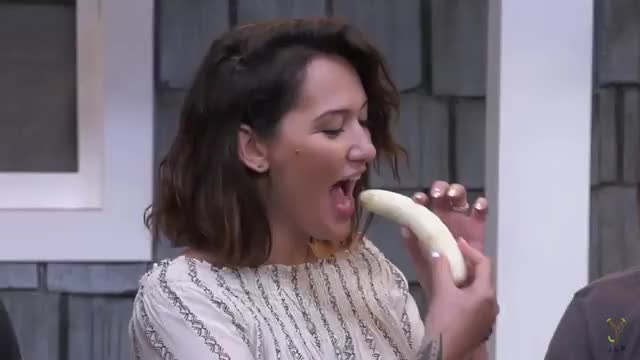 Geovanna fits a banana in her mouth