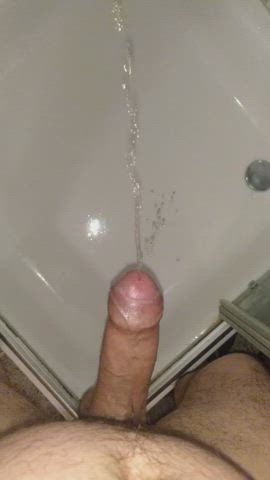Pissing with a hard cock