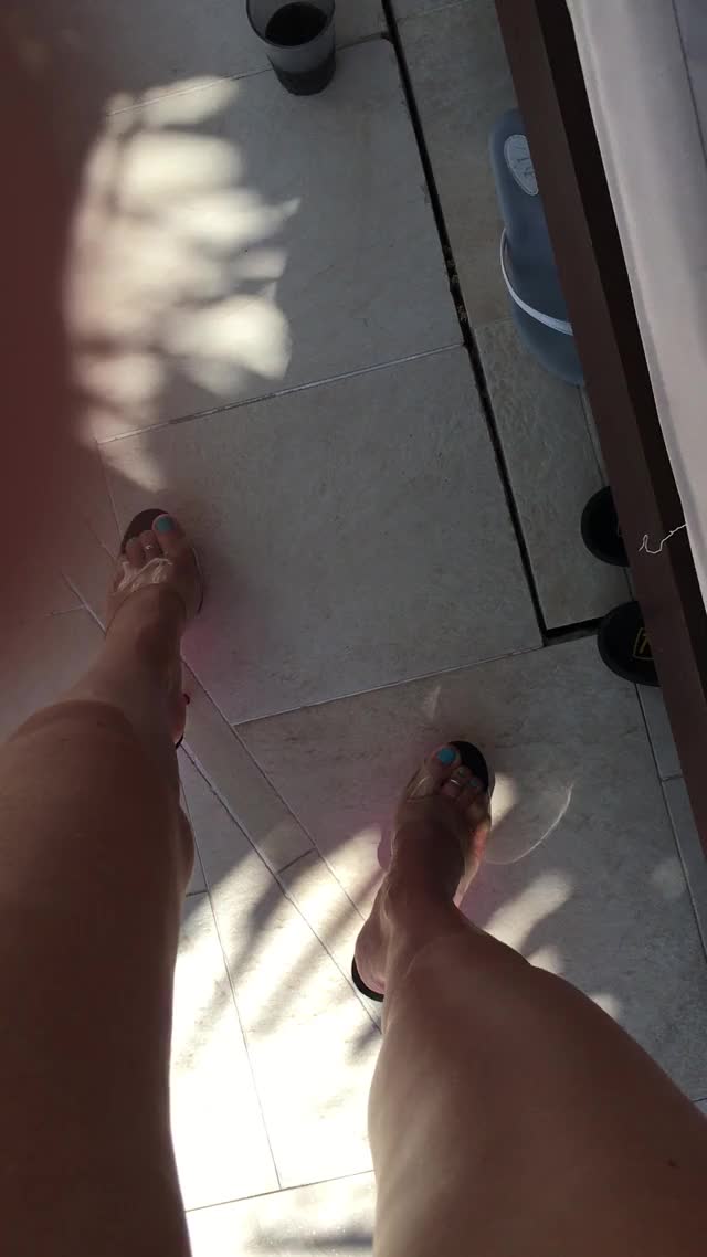 POV walking in Pleaser heels at the hotel pool