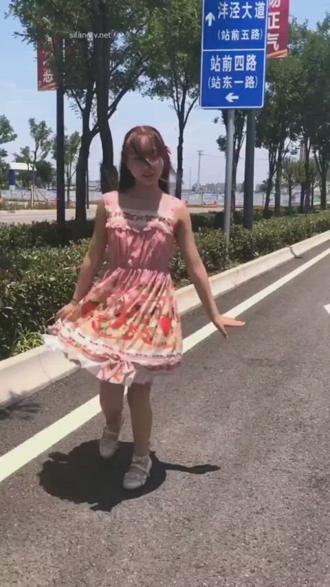 chinese girl dancing in public