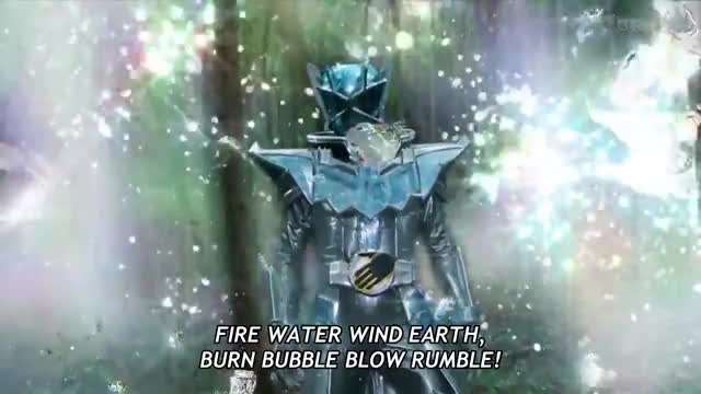 Kamen Rider Wizard Infinity slices through magic barrier