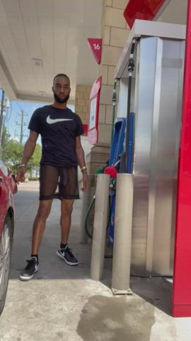 Standing in public with my see through shorts on pumping gas.