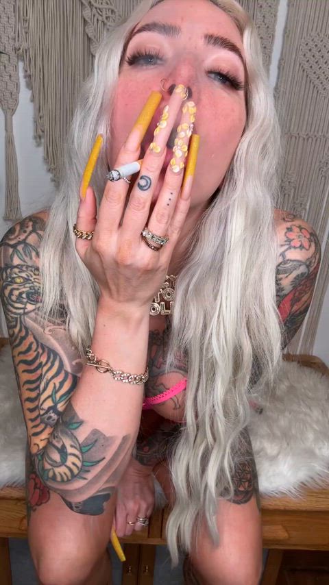 Long nails smoking bimbo 