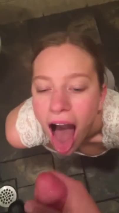 Sucking in a public restroom with messy facial