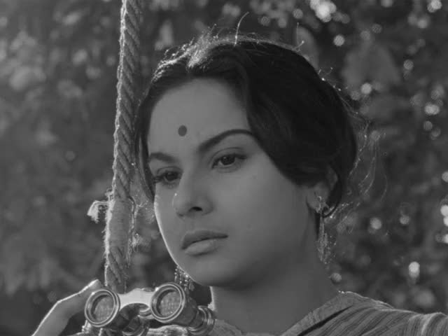 Charulata-1964-GIF-00-47-18-Madhabi-Mukherjee-binoculars