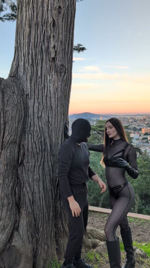 hooded submissive in the woods gets a rude awakening from Mistress