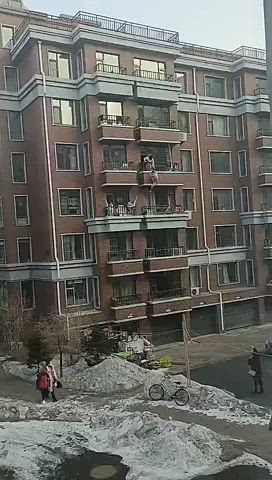 Naked person falls from a balcony
