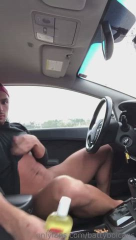 Buddy loves jacking off his cock in his car at the park waiting for someone to walk