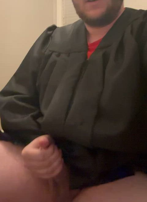 Cumming in my graduation gown