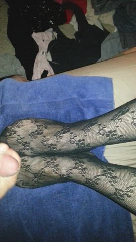 Wife giving me a stocking footjob with cumshot