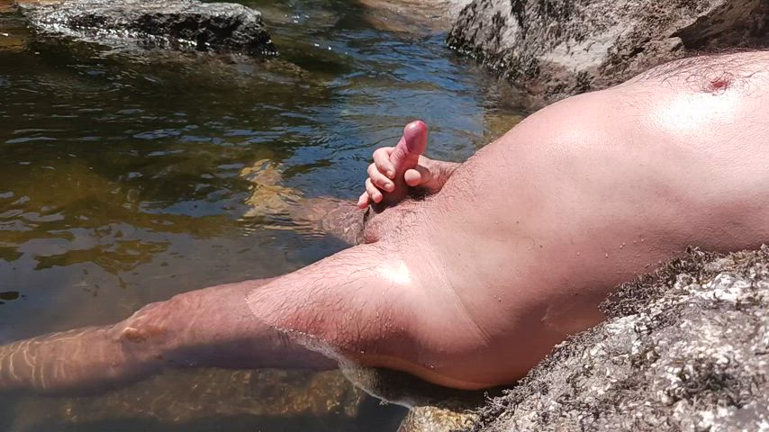 Wet masturbation in the river